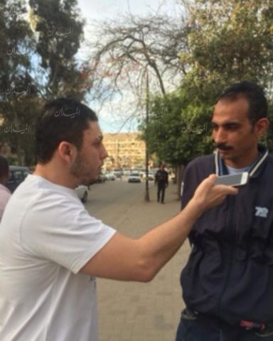 محرر الميدان مع أحد السائقين