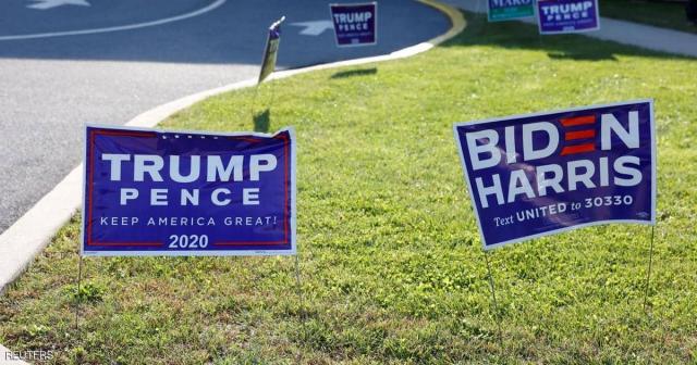 لافتات انتخابية للمرشحين ترامب وبايدن