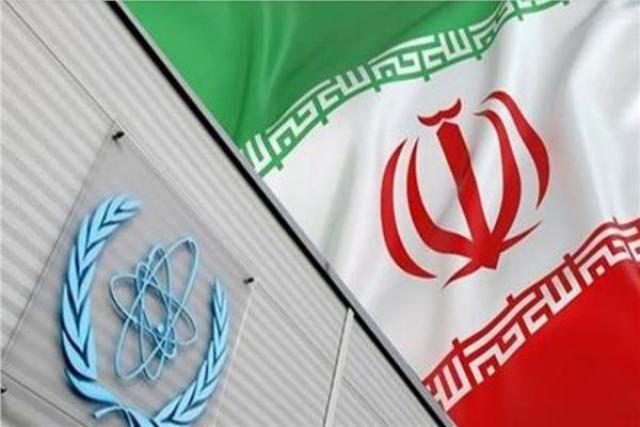 علم إيران وشعار الوكالة