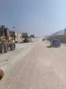 بدء مشروع الرصف بطريقR1 بالمنطقة الصناعية والاستثمارية بأبو رواش